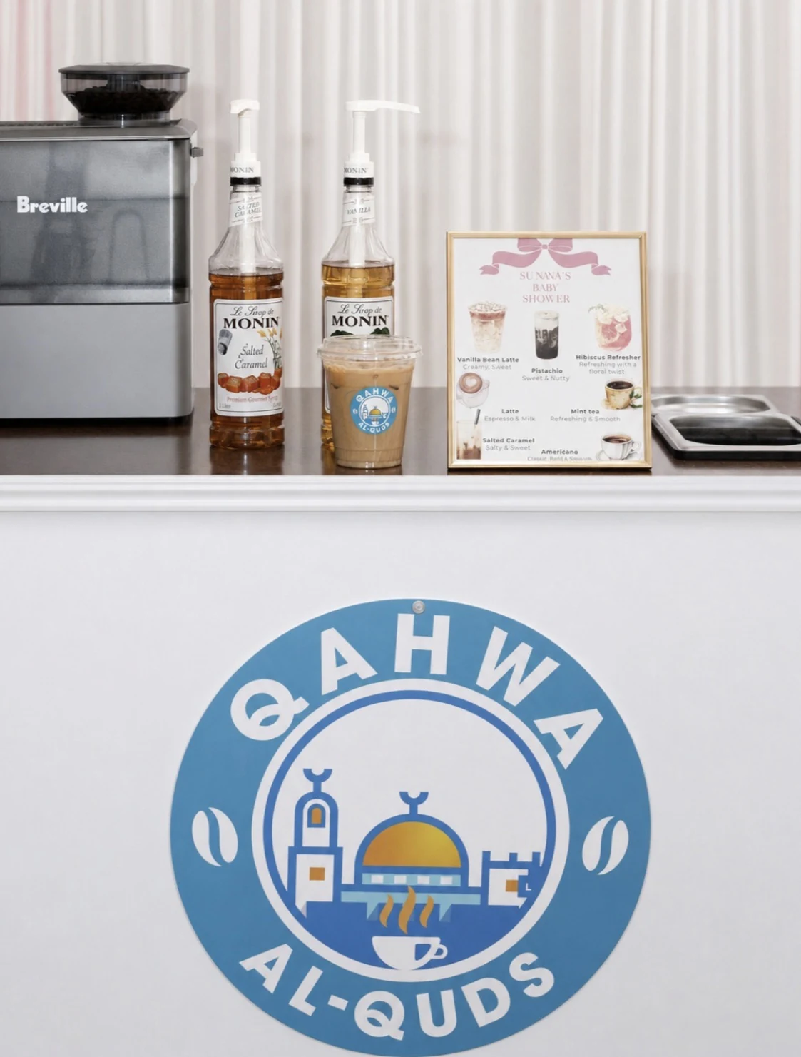 Qahwa Al Quds event menu and coffee cart display
